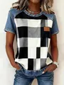 Detailed view of women's short sleeve top with checkerboard print and denim stitching. - S / Tops / Black White Grey Plaid