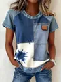 Detail showing a casual patchwork denim t-shirt with tie-dye print and small chest patch - S / Tops / Denim Patchwork