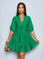 Elegant emerald green mini dress featuring a deep V-neck and tiered pleated design - Green