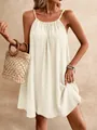Detailed view showing the elegant cream halter mini dress with textured crinkle fabric - Apricot