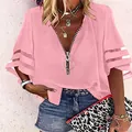Dettaglio della camicetta rosa da donna con scollo a V, cerniera e maniche a campana in mesh - Taglia S / Top / Rosa