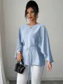 Full view of elegant light blue bell sleeve blouse featuring a matching buckled belt - Light Blue