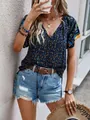 Bohemian floral V-neck short sleeve blouse styled with denim shorts and accessories - S / Tops / Blue