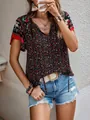 Close-up of bohemian floral print V-neck shirt with ethnic style details - S / Tops / Coffee