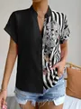 Schicke Damenbluse mit kurzen Ärmeln im geteilten Design mit Blumen- und Streifenmuster - S / Oberteile / Schwarz