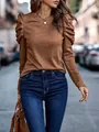 Detailed view of a caramel slim-fit top featuring stylish pleated puff sleeve details - S / Tops / Orange