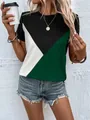 Losse casual dames T-shirt met opvallend geometrisch color-block patroon in zwart en groen - S / Tops / Groen