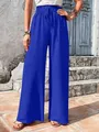 Detailed macro view of royal blue bubble grid textured wide leg casual summer pants - Blue