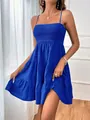 Close-up view of a royal blue tiered mini dress featuring a smocked bodice and thin straps - S / Spaghetti Strap Tiered Style / Blue