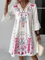 Close-up of white Boho-style dress with V-neck lace patchwork and pink floral print - S / Rose Red