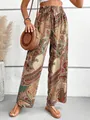 Vista dettagliata dei pantaloni larghi a fantasia paisley con vita elasticizzata. - Taglia S / Pantaloni e gonne / Kaki