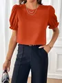Elegante camicetta arancione con maniche a sbuffo, girocollo e dettagli volant - arancio-rosso