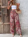 Vista a figura intera di pantaloni a gamba larga con stampa paisley bohémien - Taglia S / Pantaloni e gonne / rosso mattone