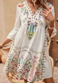 Close-up of bohemian floral print dress with V-neck lace trim and flared sleeves - S / Apricot