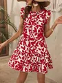 Detail shot of a summer red leaf print mini dress featuring ruffled sleeves and hem. - S / Top And Bottom / Red