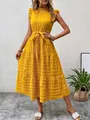 Detailed view of an elegant yellow ruffled sleeveless textured maxi dress with waist tie - S / Yellow