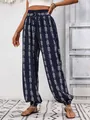 Full view detail of navy blue bohemian print lantern pants with elastic waist design - Dark Blue