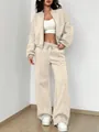 Detailed view of women's beige two-piece tracksuit with zip-up cardigan and wide-leg pants - S / Top And Bottom / Apricot