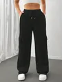Detail of black wide-leg cargo sweatpants with drawstring waist and side pockets - S / Bottoms / Black