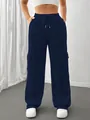 Full front view of navy blue wide-leg cargo sweatpants featuring side flap pockets - S / Bottoms / Blue