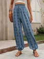 Bohemian blue high-waist lantern pants with ethnic geometric patterns on a model - S / Bottoms / Teal