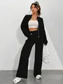 Full detail of black zip-up tracksuit set featuring wide-leg pants on female model - S / Top And Bottom / Black