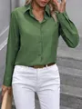Detailed view of green linen-textured button-down shirt on a model. - S / Dark Green