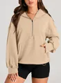 Detailed view of women's casual half-zip hooded sweatshirt featuring a front kangaroo pocket. - Off White