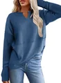 Close-up of women's blue waffle knit patchwork sweatshirt showing texture and loose fit - S / Tops / Blue