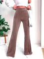 Detailed view of brown high-waisted corduroy flared pants with ribbed texture - Coffee