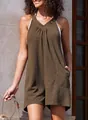 Detailed view of women's sleeveless waffle knit casual romper featuring side pockets in olive - Brown