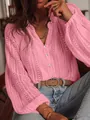 Detailed view of pink hollow lace fabric and buttons on a V-neck long sleeve shirt - S / Tops / Pink