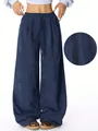 Detailed macro view showing navy blue corduroy fabric texture on high waist wide-leg pants - S / Bottoms / Blue