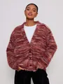 Detail view of a vintage Maillard fuzzy cardigan with a deep V-neck and button closure - S / Tops / Red