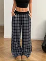 Detail view of high-waisted plaid wide-leg pants with drawstring waist - S / Bottoms / Navy Blue