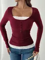 Detail of burgundy ribbed long sleeve top featuring delicate lace trim and buttons - S / Tops / Burgundy