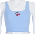 Close-up view of a light blue ribbed crop top featuring cherry embroidery on the chest. - S / Tops / Blue