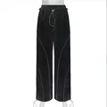 Front view of black high-waisted joggers featuring reflective piping and adjustable drawstrings - S / Bottoms / Black