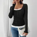 Black long-sleeved ribbed top featuring lace trim and chest buttons, slim fit casual style. - S / Tops / Black