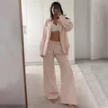 Completo da casa a due pezzi a righe da donna con camicia a maniche lunghe e pantaloni larghi - Taglia S / Top E Pantaloni / Rosa pelle