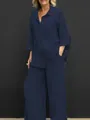 Vista completa di un set camicia a maniche lunghe e pantaloni a gamba larga blu notte. - Blu navy