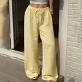 Pantaloni larghi gialli a vita alta alla moda con comoda coulisse elastica in vita. - Taglia S / Pantaloni e gonne / Giallo