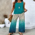 Detailed view of women's summer two-piece set with teal tank top and gradient pants. - S / Top And Bottom / Lake Green Striped