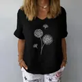 Loose black V-neck cotton linen short sleeve top featuring white dandelion floral print - S / Tops / Black