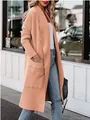 Gedetailleerd overzicht van een casual lang damesvest in perzikkleur met zakken - 2XL / Tops / Lotusroze