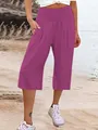 Pantaloni capri estivi da donna con vita alta a nido d'ape nel colore magenta-viola scuro - Rosso rosa