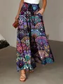 Detailed view of bohemian wide-leg pants featuring colorful geometric mandala patterns. - S / Bottoms / Purple