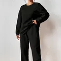 Completo felpa in maglia nera da donna con motivo a lettere a rilievo - Nero-1