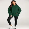 Women's oversized hooded sweatshirt in dark green for casual autumn winter wear - S / Tops / Green