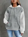 Detail view of the grey and white quilted texture hoodie with kangaroo pocket - S / Tops / Grayish White